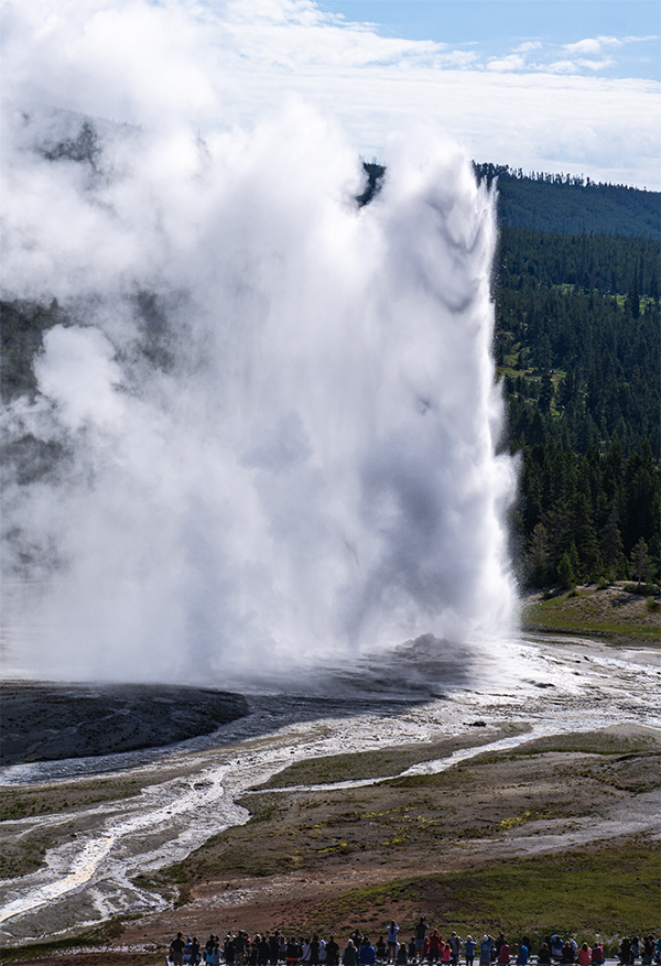 Old Faithful Geyser from the top of Old Faithful Inn