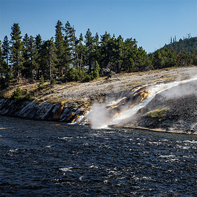 Firehole River by Midway Geyser Basin near Excelsior Geyser.